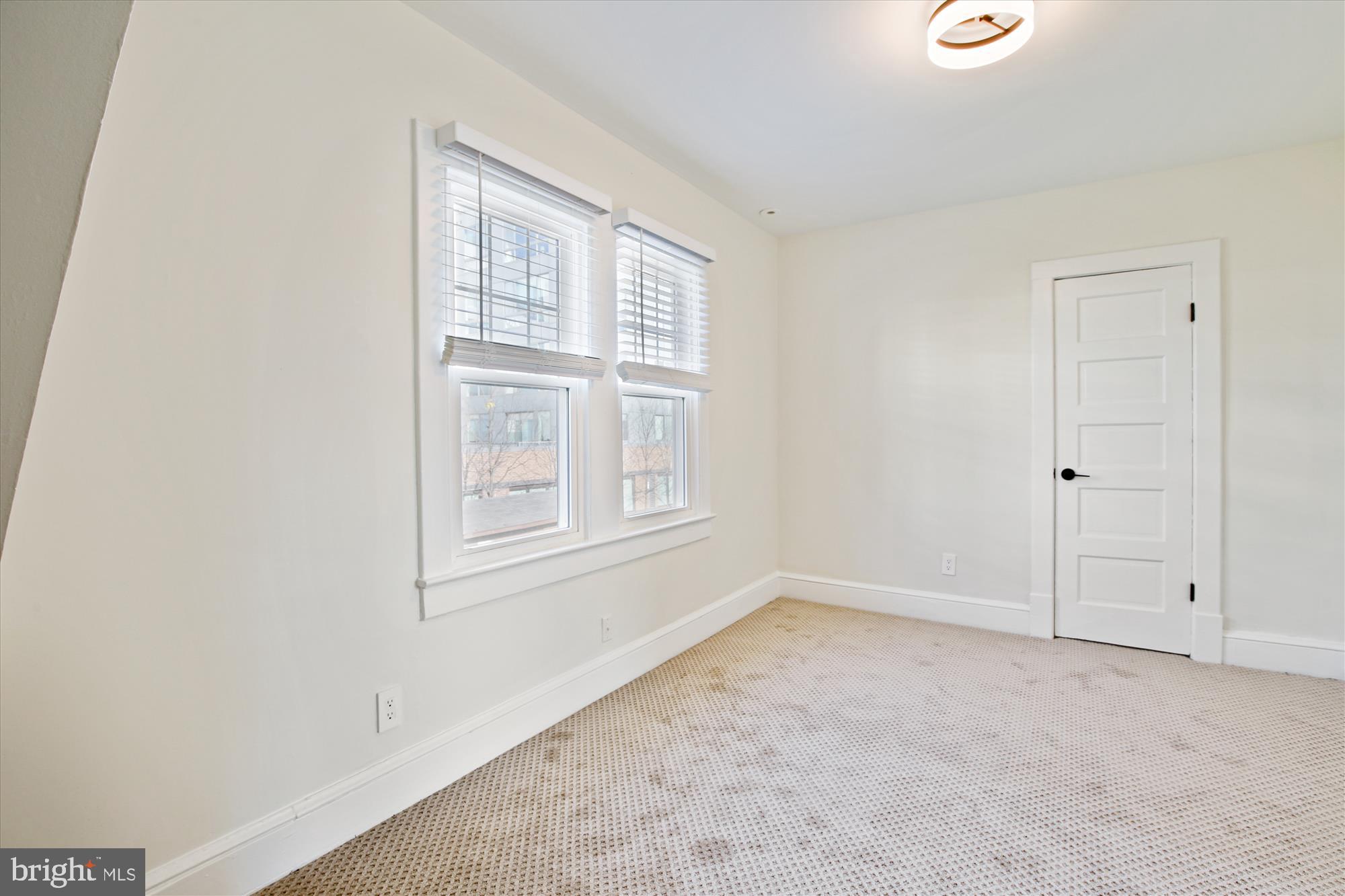 3107 9th Road North Arlington, VA 22201 - Photo 26 of 34 a view of an empty room with a window