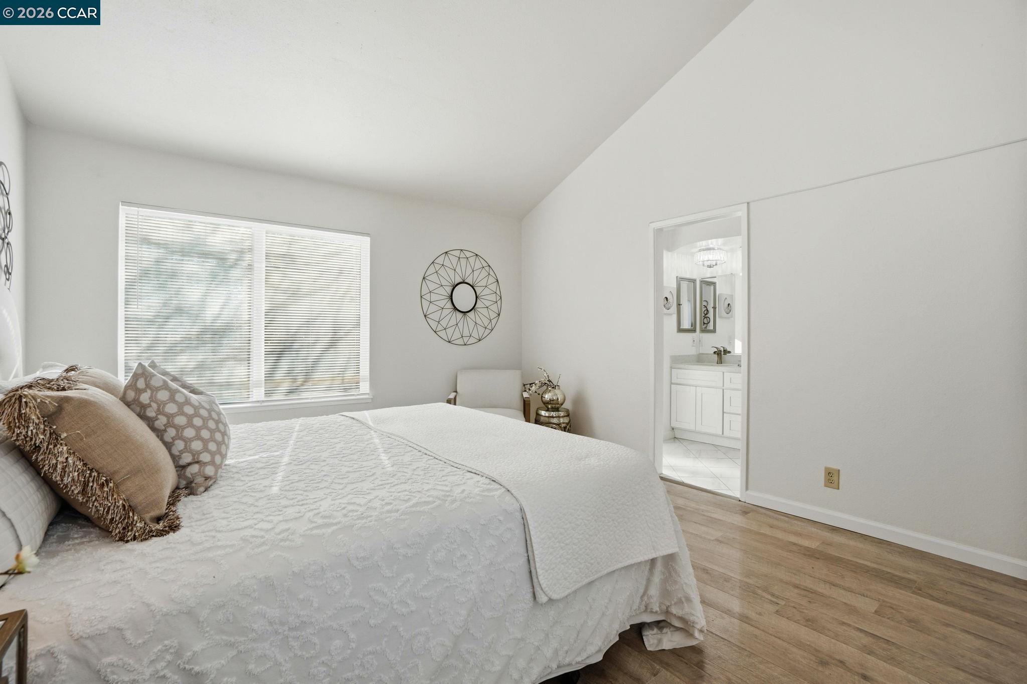 1255 Detroit Avenue, Unit 3 Concord, CA 94520 - Photo 12 of 30 a bedroom with a bed and a window