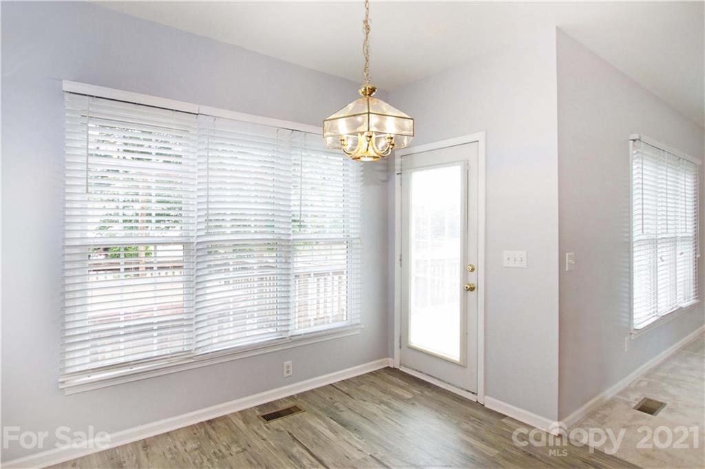 10402 Friarsgate Road Huntersville, NC 28078 - Photo 20 of 46 a view of an empty room with a window