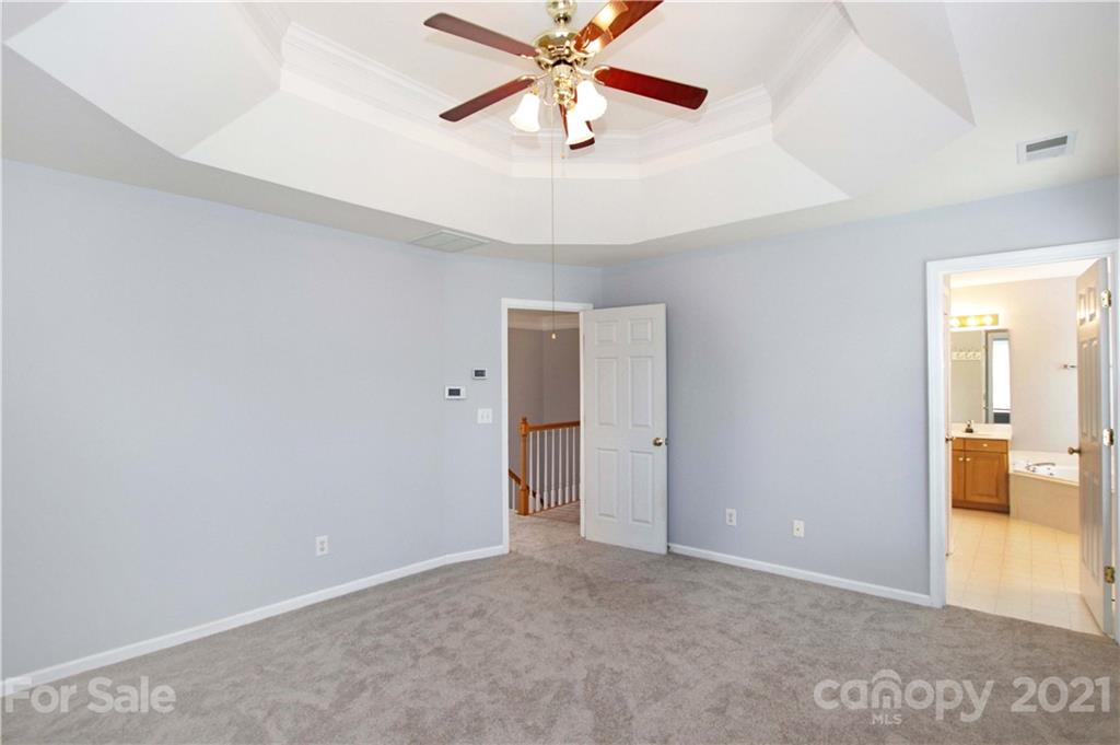 10402 Friarsgate Road Huntersville, NC 28078 - Photo 23 of 46 a view of an empty room and window