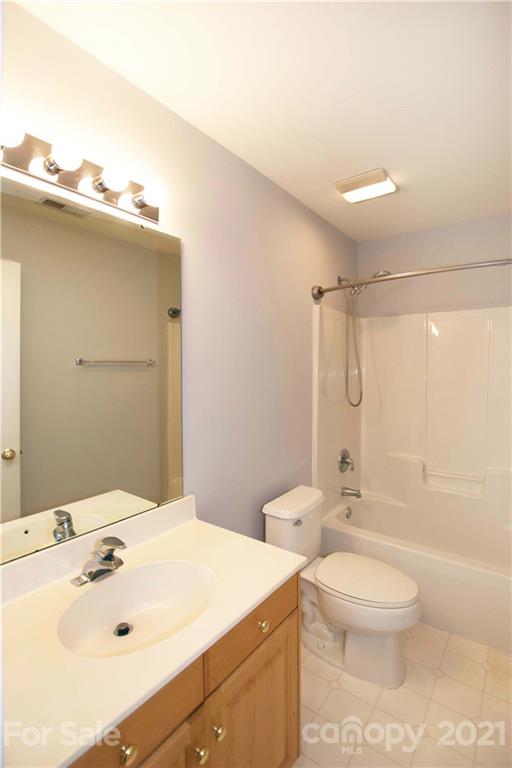 10402 Friarsgate Road Huntersville, NC 28078 - Photo 32 of 46 a bathroom with a sink a toilet and shower