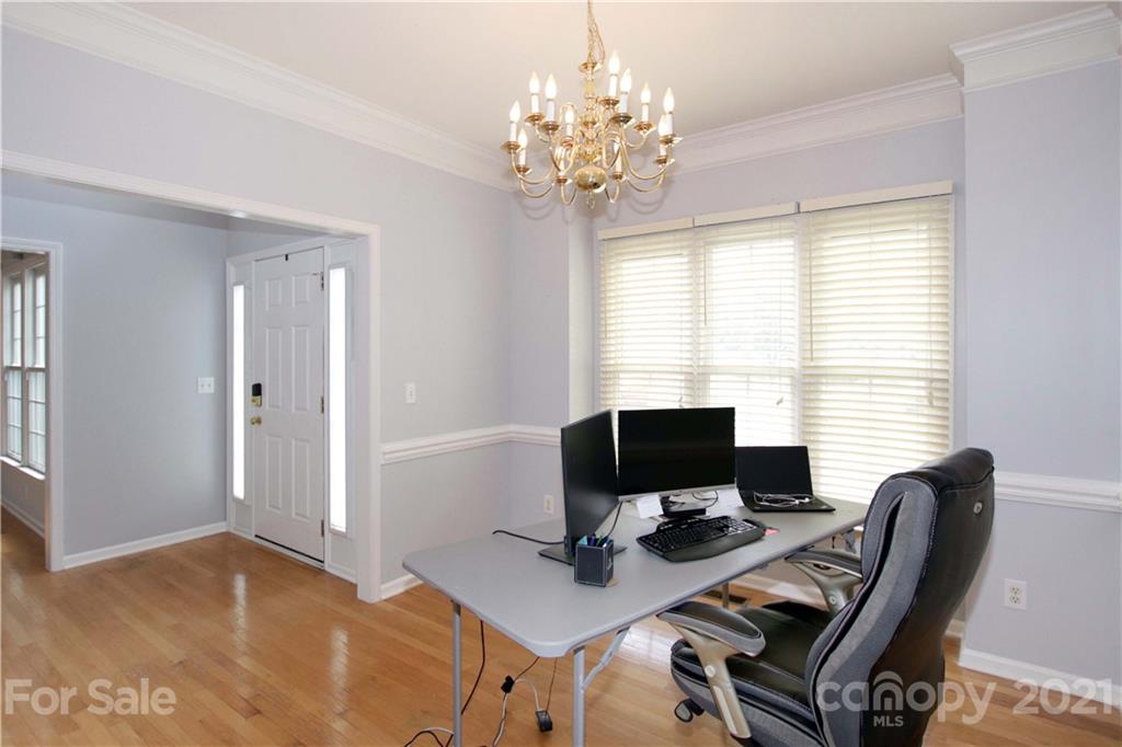 10402 Friarsgate Road Huntersville, NC 28078 - Photo 5 of 46 a view of a workspace with furniture and a window