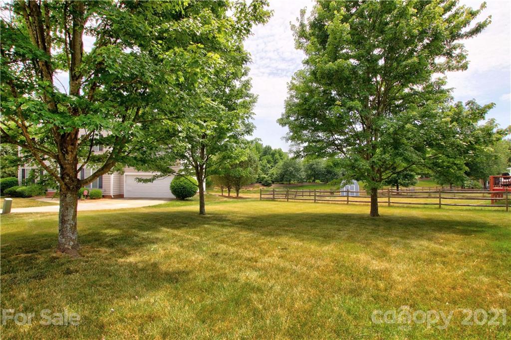 10402 Friarsgate Road Huntersville, NC 28078 - Photo 42 of 46 a swimming pool with an outdoor space and seating area