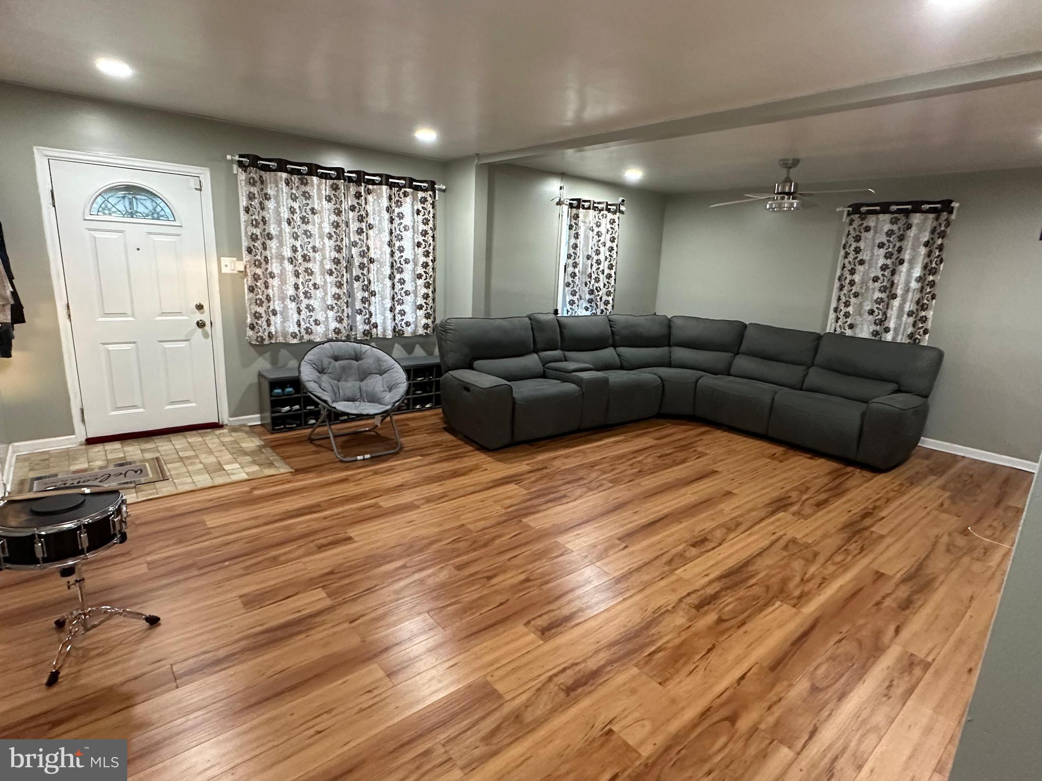 102 Philmar Avenue Cherry Hill, NJ 08003 - Photo 2 of 10 a living room with furniture and a wooden floor