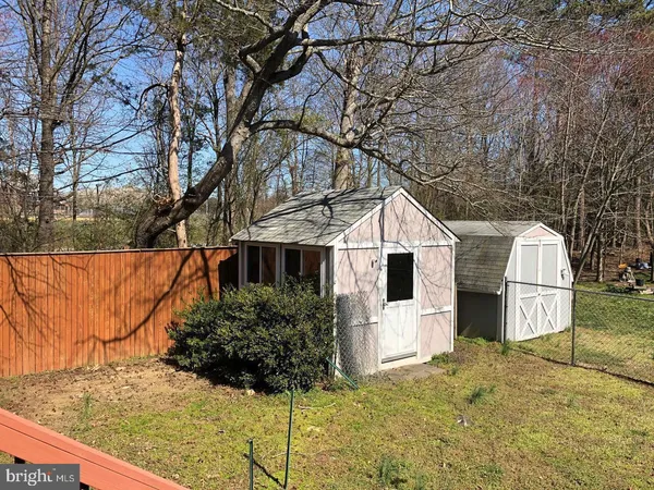 a view of a back yard of the house