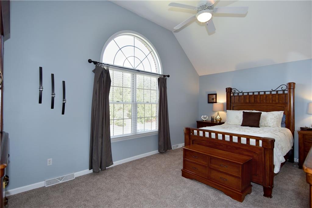 107 Beacon Hill Drive Cranberry Township, PA 16066 - Photo 12 of 25 a bedroom with a bed and a window