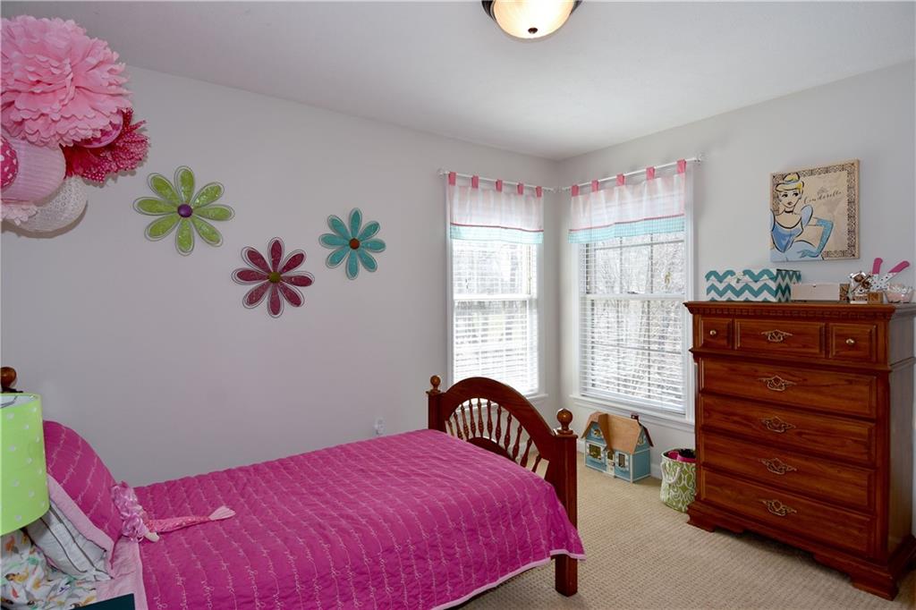 107 Beacon Hill Drive Cranberry Township, PA 16066 - Photo 21 of 25 a bedroom with a bed and a window