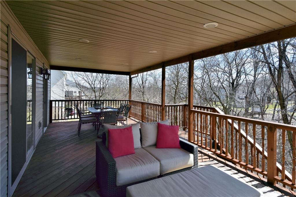 107 Beacon Hill Drive Cranberry Township, PA 16066 - Photo 22 of 25 a balcony with wooden floor and furniture