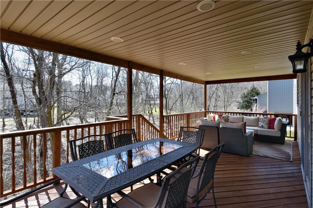 107 Beacon Hill Drive Cranberry Township, PA 16066 - Photo 23 of 25 a view of balcony with wooden floor and outdoor seating