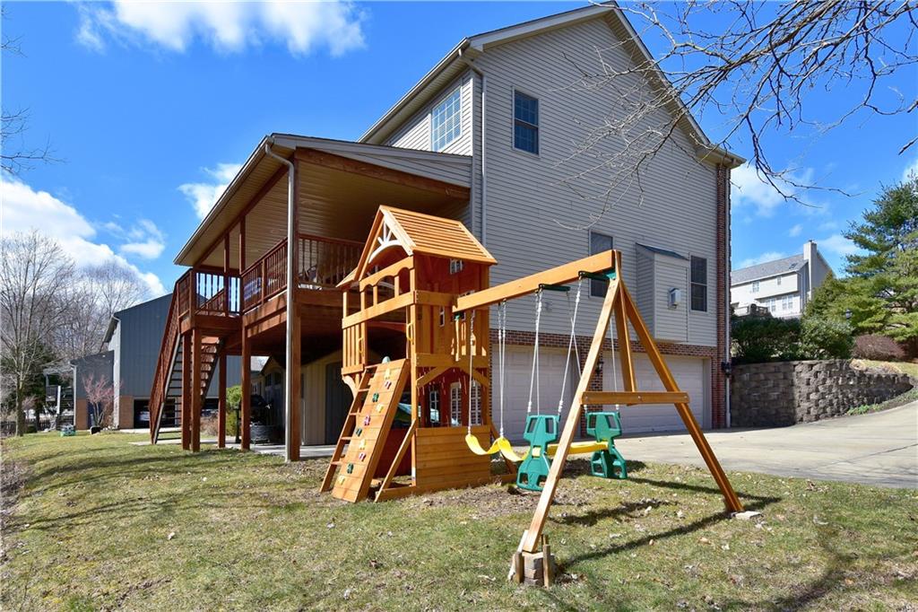107 Beacon Hill Drive Cranberry Township, PA 16066 - Photo 24 of 25 a view of a park with a slide