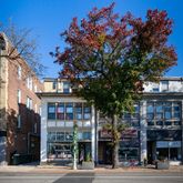 a view of a building and a street