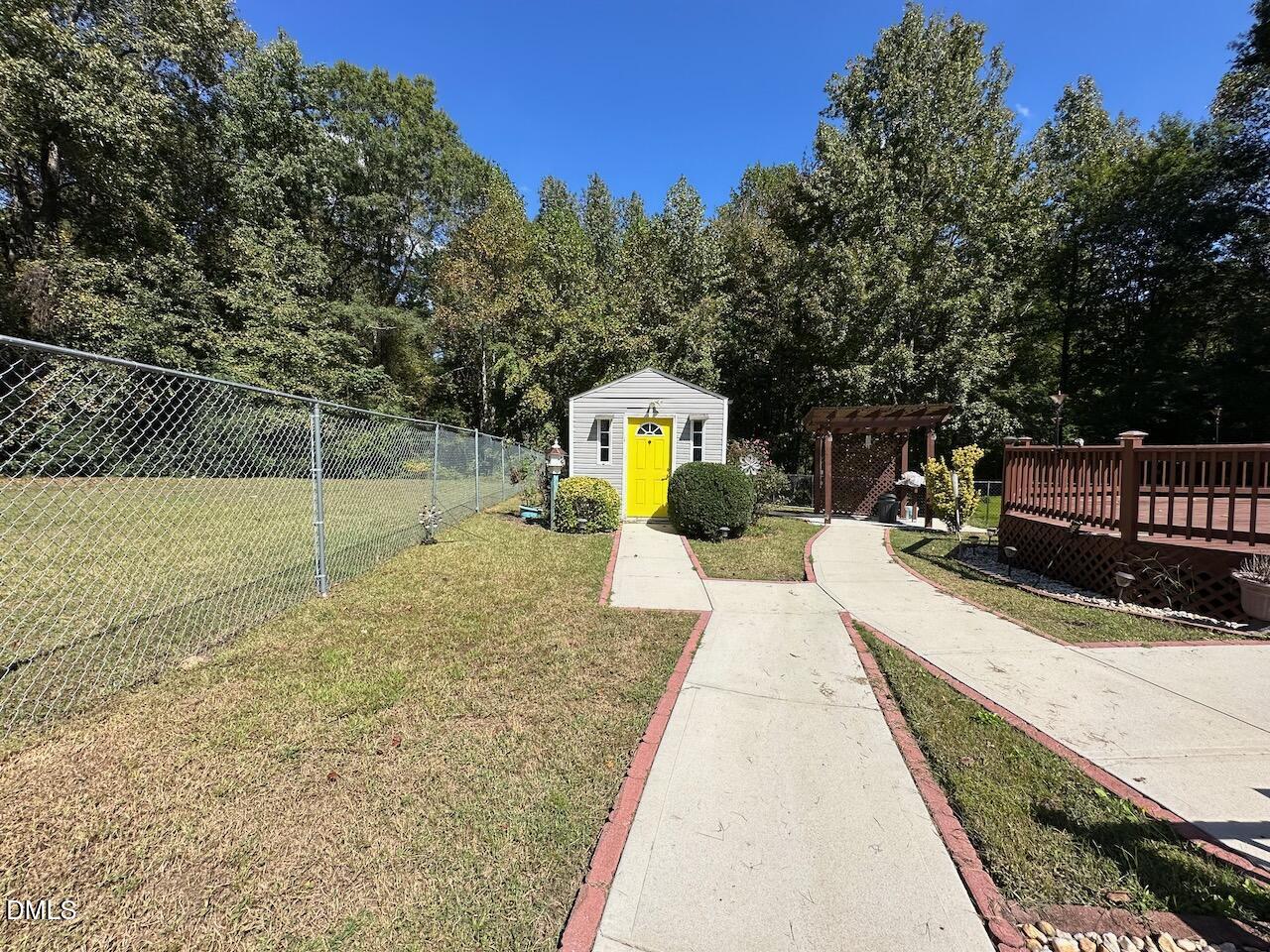 4617 Six Siblings Circle Raleigh, NC 27610 - Photo 29 of 35 a view of a swimming pool with a patio