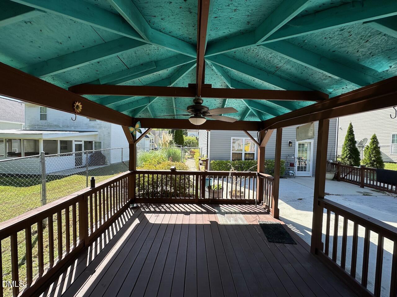 4617 Six Siblings Circle Raleigh, NC 27610 - Photo 31 of 35 a view of a porch with wooden floor