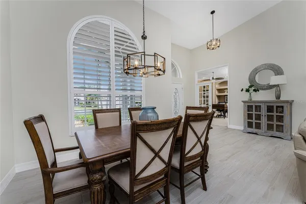 a view of kitchen with cabinets and wooden floor