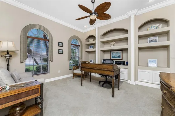 a view of a swimming pool with a patio