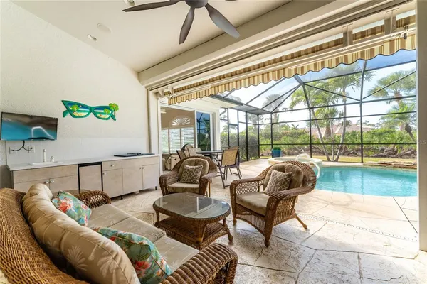 a view of a swimming pool with a patio