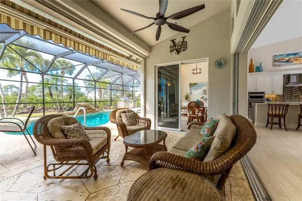 a very nice looking empty room with a chandelier