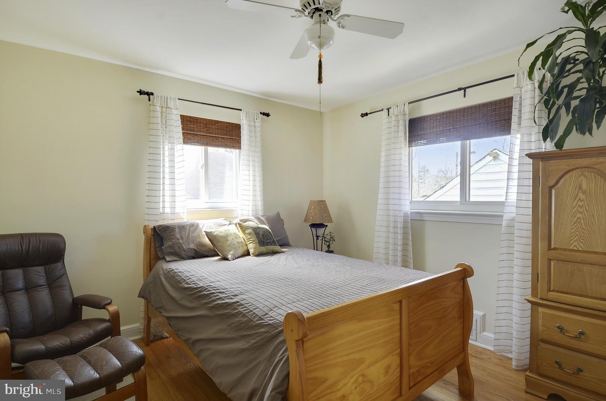 5912 Craig Street Springfield, VA 22150 - Photo 11 of 24 a bedroom with a bed and window