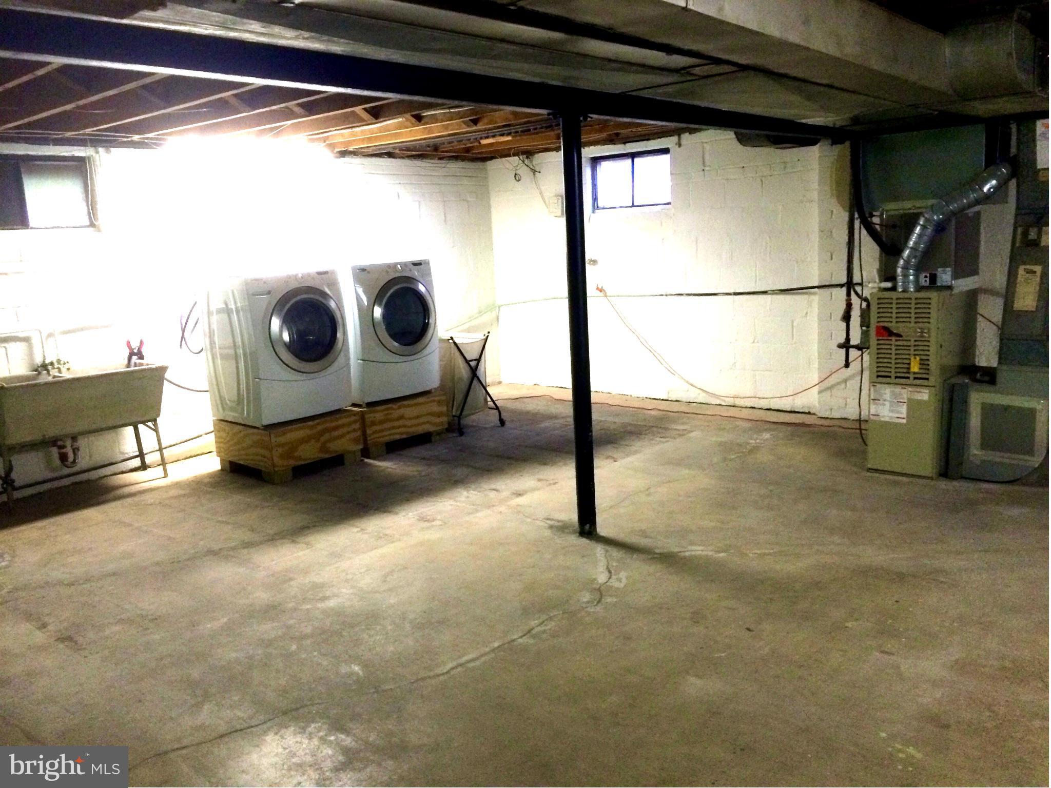 5912 Craig Street Springfield, VA 22150 - Photo 16 of 24 a utility room with dryer and washer