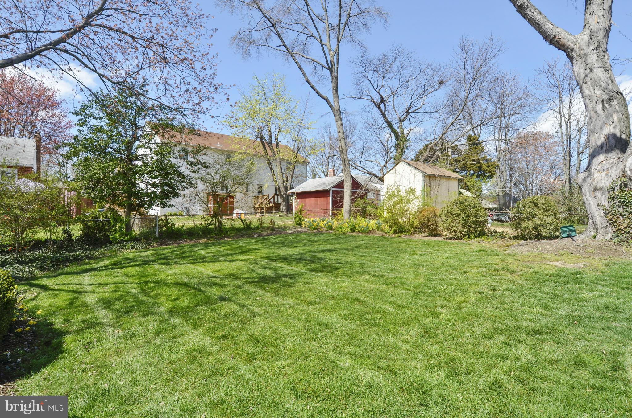 5912 Craig Street Springfield, VA 22150 - Photo 20 of 24 a backyard of a house with lots of green space