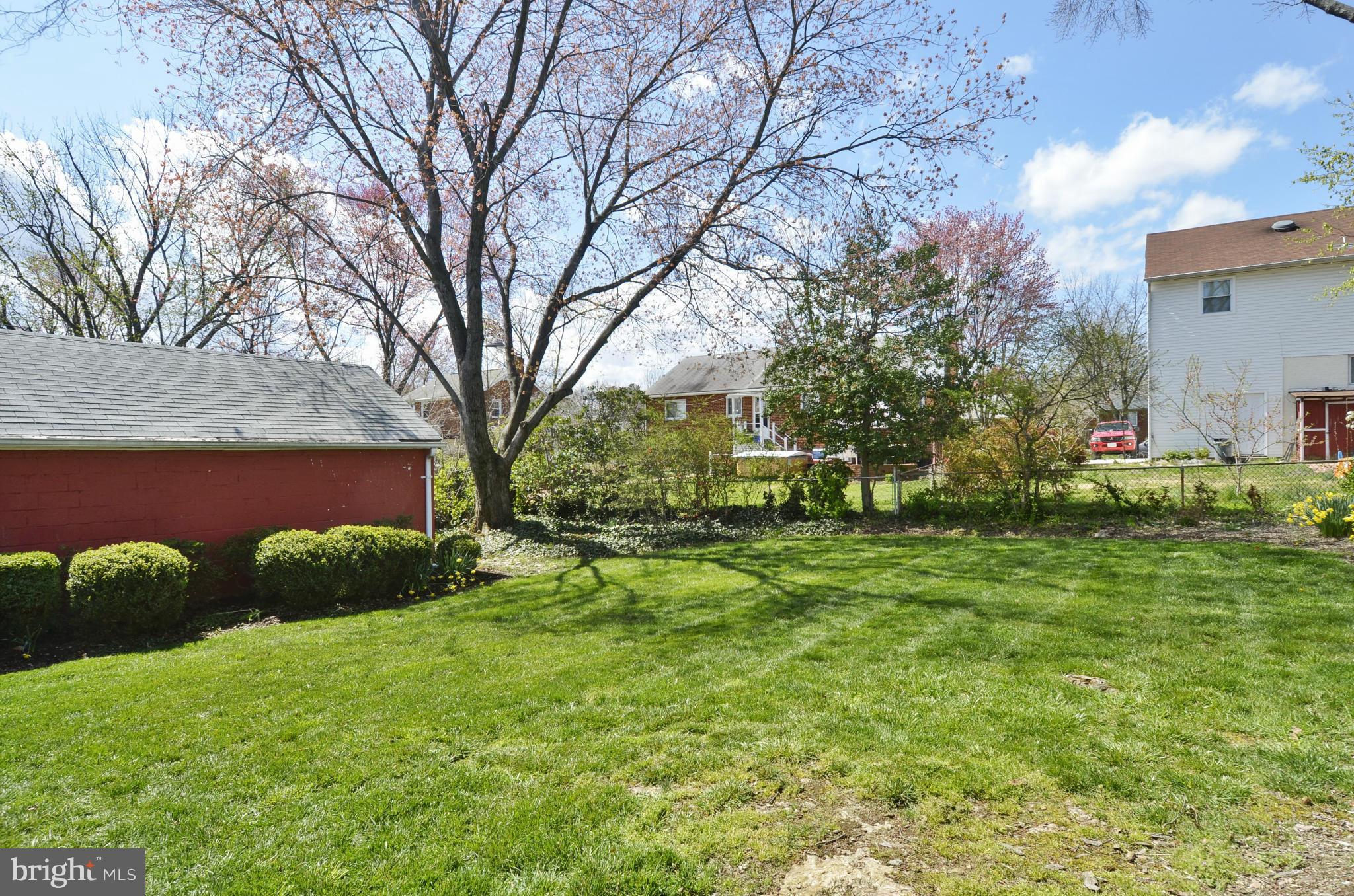 5912 Craig Street Springfield, VA 22150 - Photo 21 of 24 a view of backyard with tree