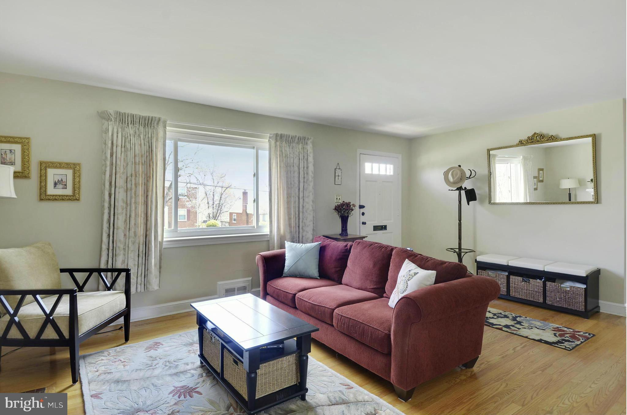 5912 Craig Street Springfield, VA 22150 - Photo 7 of 24 a living room with furniture and a window