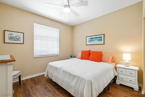 a bedroom with a bed and a furniture