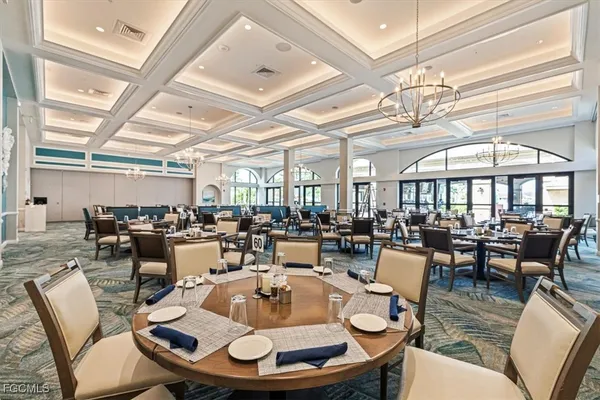 a view of a chairs and tables in the patio