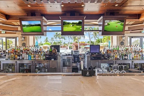 a view of a patio with couches and potted plants