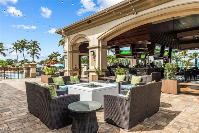 a picture of a bench in front of a wall