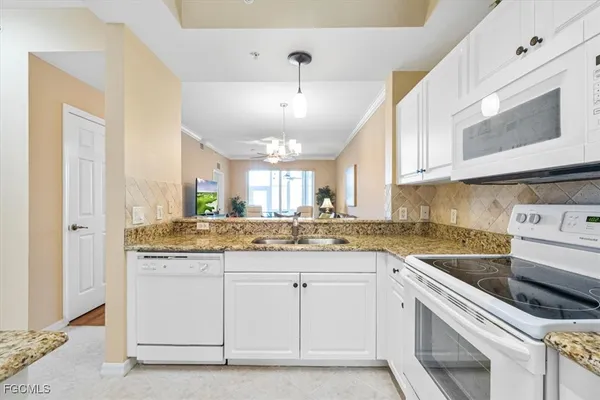 a view of a bathroom sink and a mirror