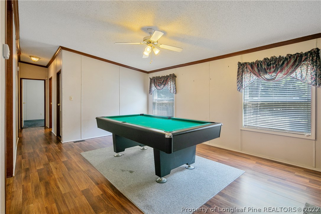 922 Magnolia Church Road Stedman, NC 28391 - Photo 20 of 49 a room with pool table and windows