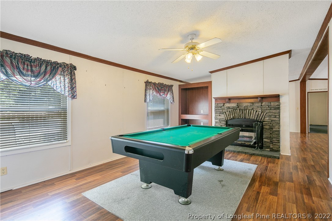 922 Magnolia Church Road Stedman, NC 28391 - Photo 21 of 49 a room with pool table and windows