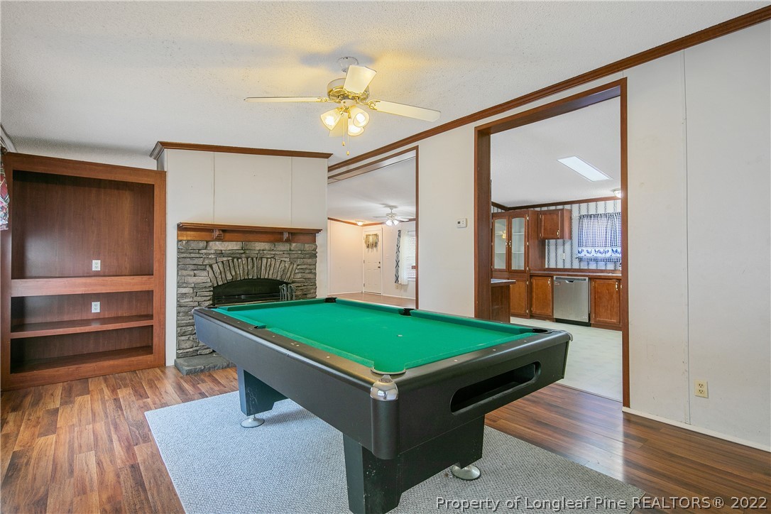 922 Magnolia Church Road Stedman, NC 28391 - Photo 22 of 49 a room with pool table and windows