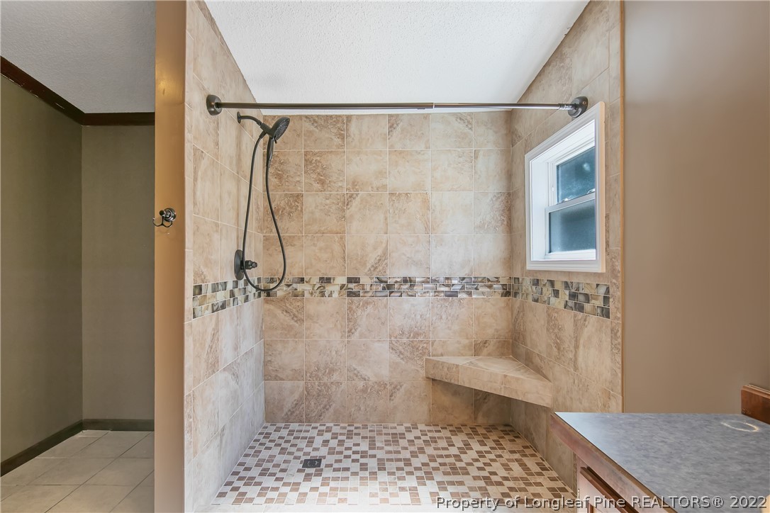 922 Magnolia Church Road Stedman, NC 28391 - Photo 31 of 49 a bathroom with a shower and a toilet