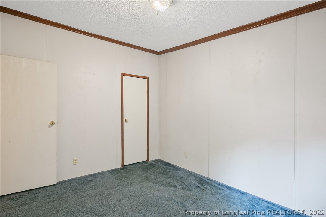 922 Magnolia Church Road Stedman, NC 28391 - Photo 36 of 49 a view of an empty room