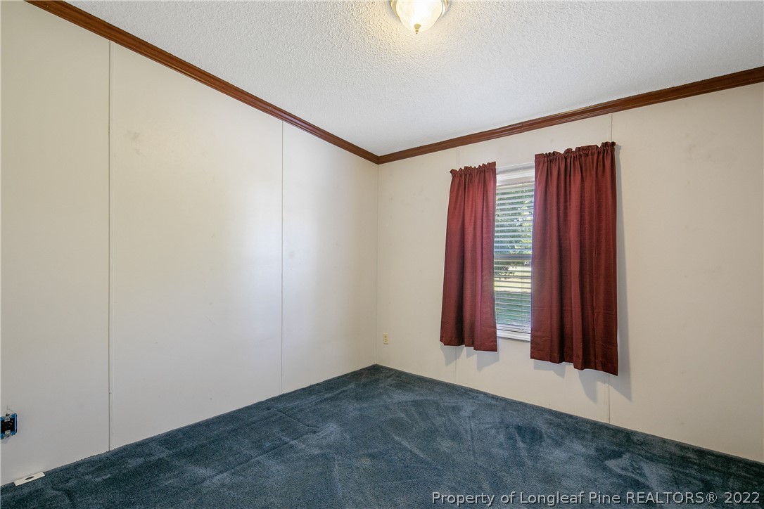 922 Magnolia Church Road Stedman, NC 28391 - Photo 38 of 49 a view of a room with a window