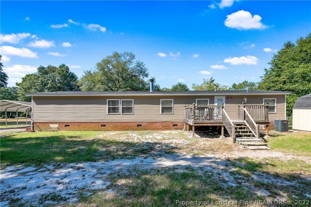 922 Magnolia Church Road Stedman, NC 28391 - Photo 45 of 49 a view of a house with backyard