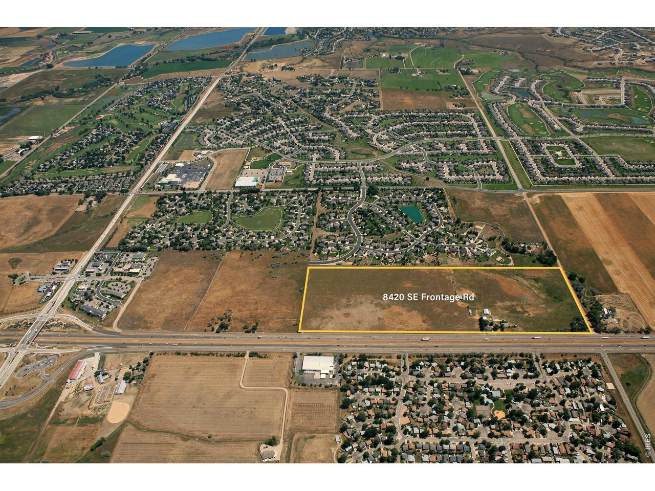 8420 Southeast Frontage Road Fort Collins, CO 80528 - Photo 1 of 2 an aerial view of residential houses with outdoor space