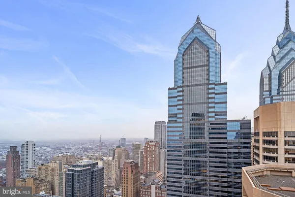 a view of a city with tall buildings