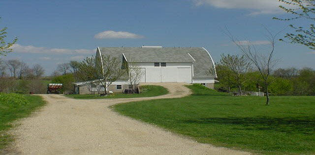 16955 Hartman Road Davis, IL 61019 - Photo 5 of 5 a front view of a house with garden