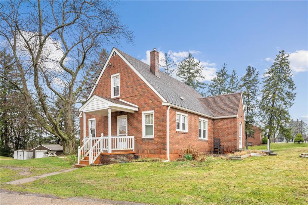 100 Frank Circle Rochester, PA 15074 - Photo 1 of 25 a front view of a house with a yard