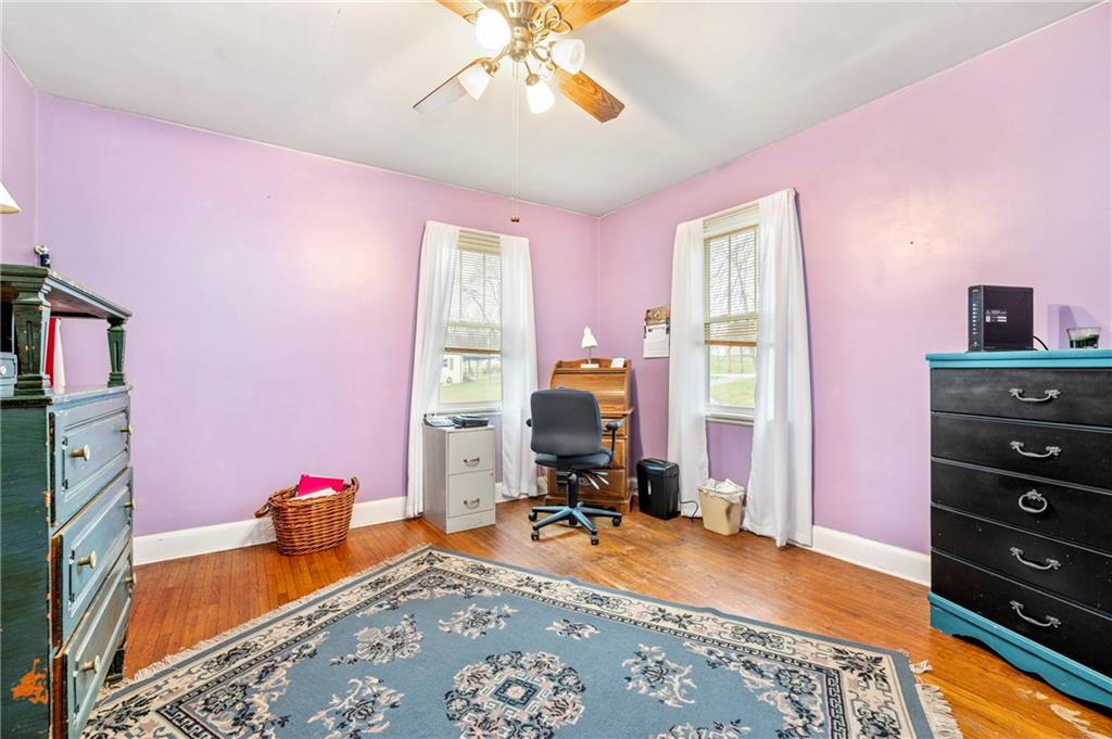 100 Frank Circle Rochester, PA 15074 - Photo 11 of 25 a bed room with a bed and a chandelier