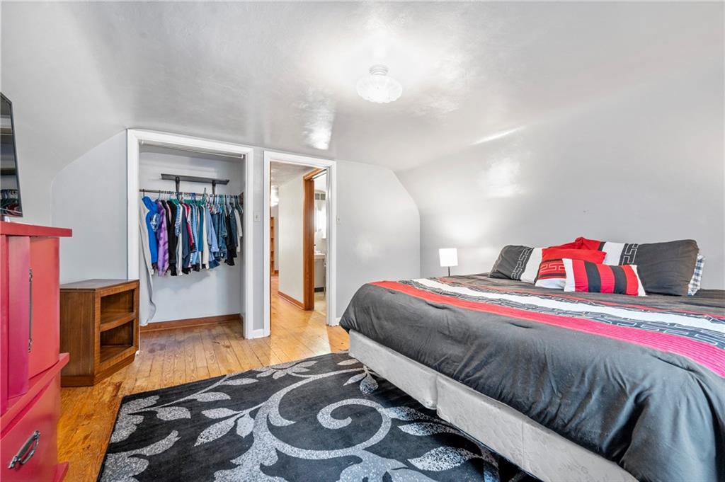 100 Frank Circle Rochester, PA 15074 - Photo 18 of 25 a bedroom with a bed and a walk in closet