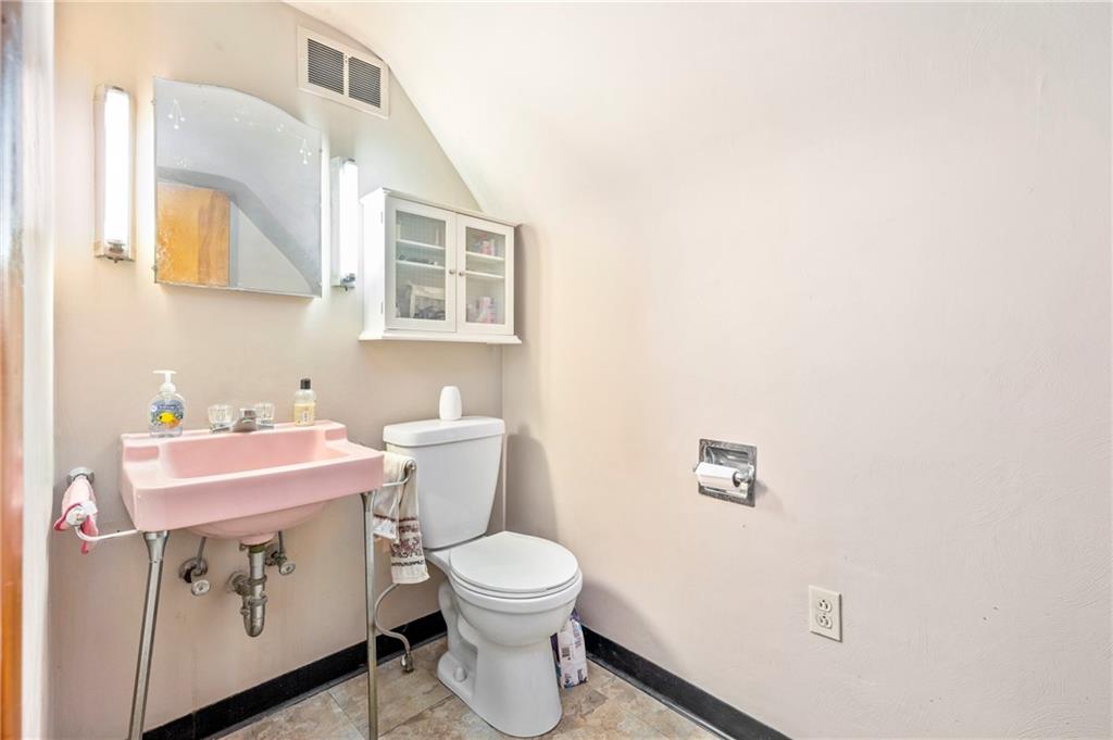 100 Frank Circle Rochester, PA 15074 - Photo 20 of 25 a bathroom with a sink mirror vanity and toilet