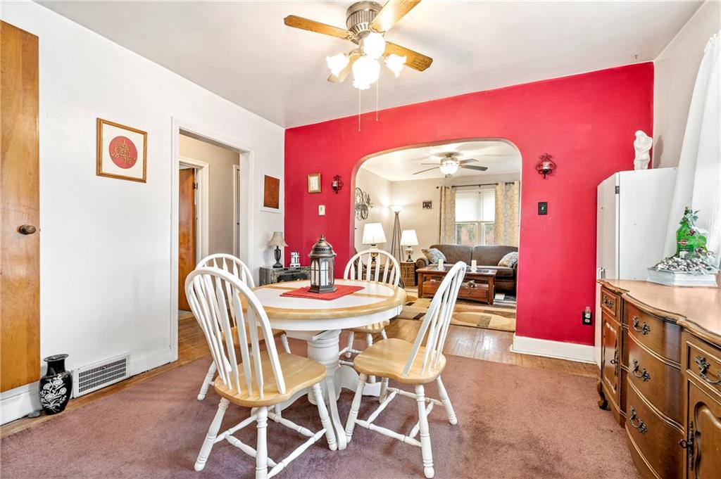 100 Frank Circle Rochester, PA 15074 - Photo 7 of 25 a view of a dining room with furniture and a chandelier fan