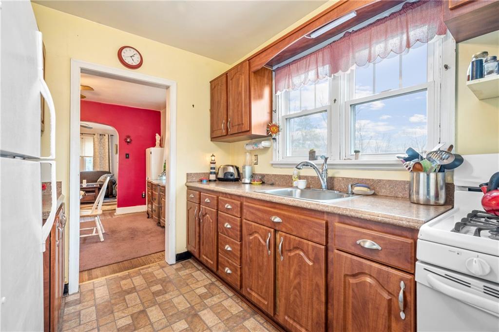100 Frank Circle Rochester, PA 15074 - Photo 8 of 25 a bathroom with a sink a vanity and a mirror