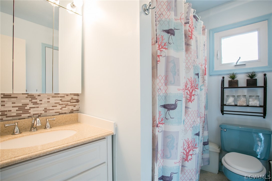 6305 Barrister Road Chesterfield, VA 23832 - Photo 22 of 31 a bathroom with a granite countertop sink and a mirror