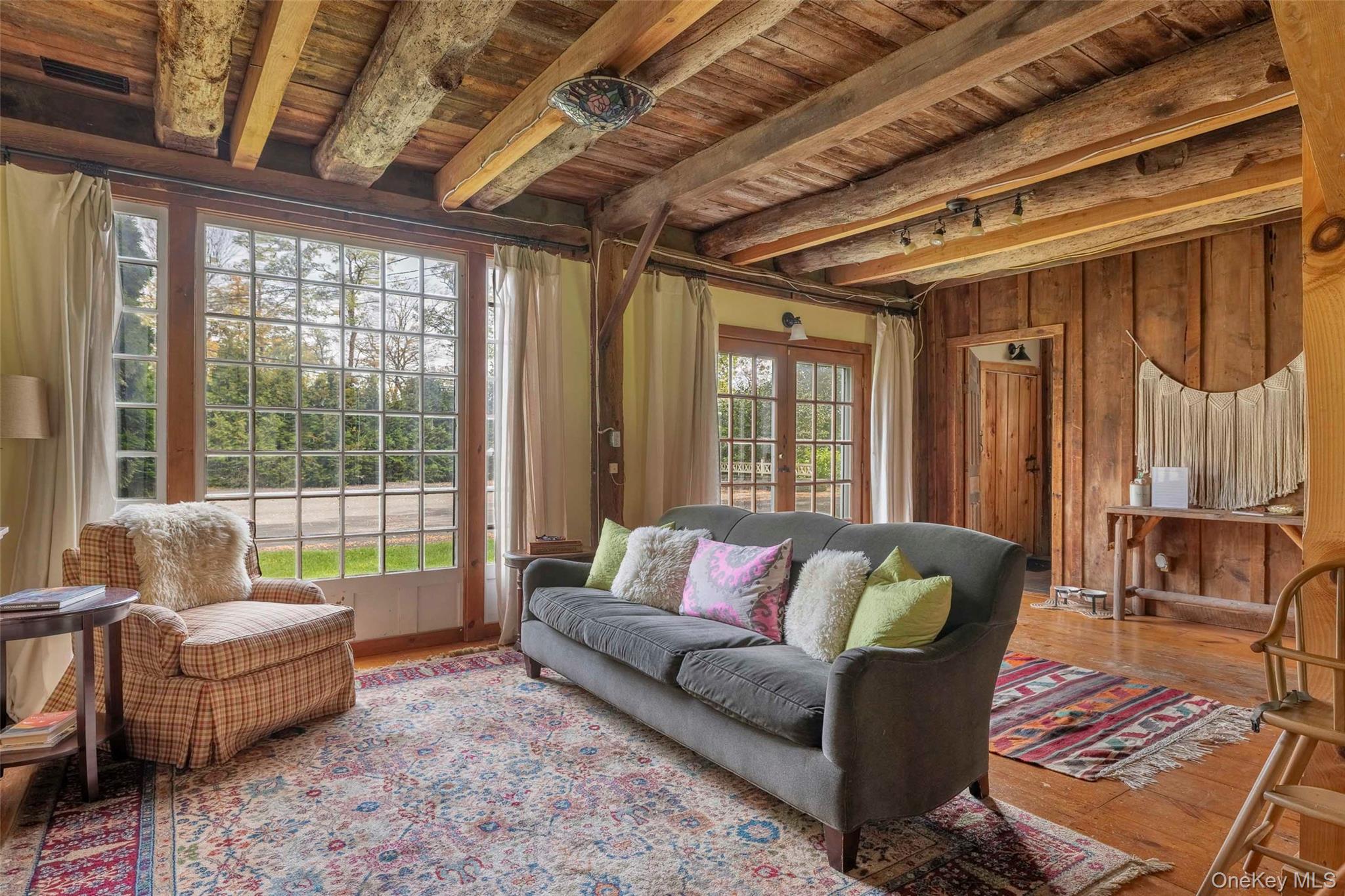 4494-4496 Highway 209 Stone Ridge, NY 12484 - Photo 19 of 48 a living room with furniture and a large window