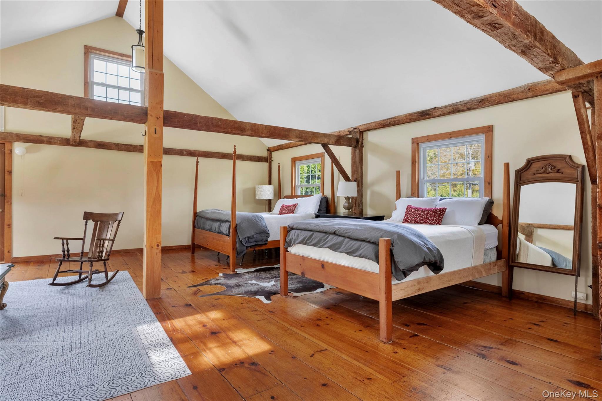 4494-4496 Highway 209 Stone Ridge, NY 12484 - Photo 23 of 48 a bedroom with a bed and large windows